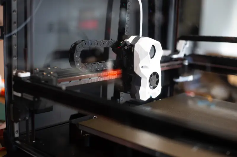 3D printer — builds an object layer by layer