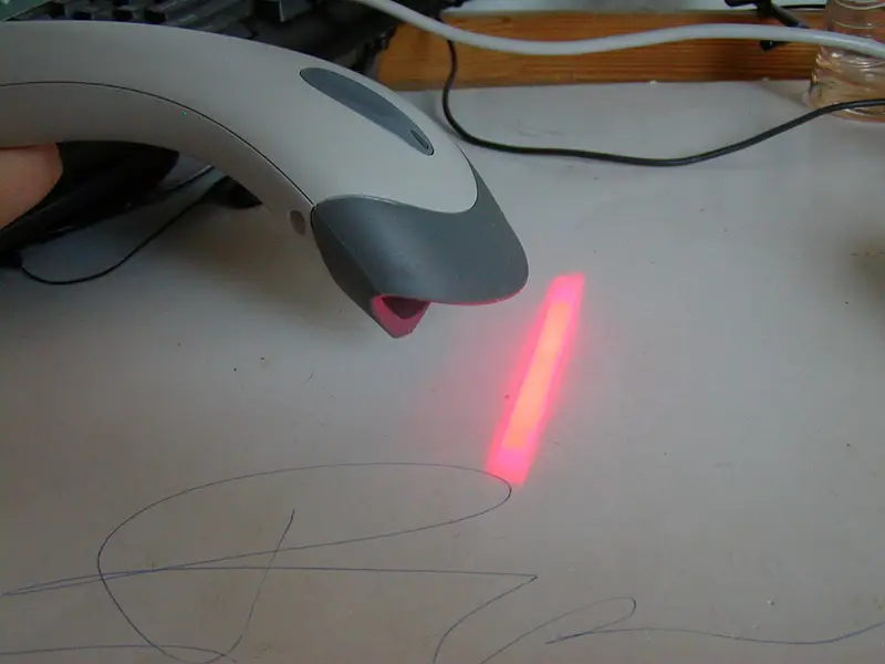 Barcode reader — input, using a laser and a sensor